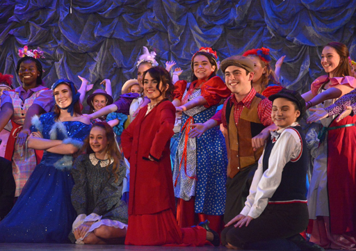 group posing in costumes after theatre performance